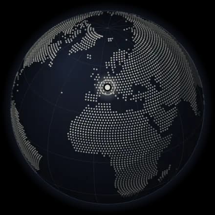 A globe with a pin on Switzerland